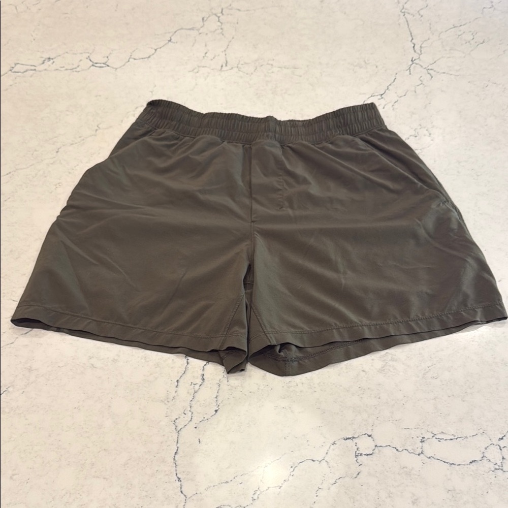 Lululemon Dark olive men pace breaker liner less, 5” inseam